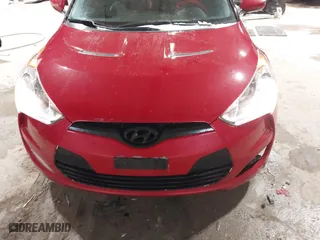 2012 Hyundai Veloster w/Black Int with VIN KMHTC6AD8CU032759, listed as a IAAI auction lot 41567265 with 156,973 mi miles. Bid and sale history available at carsss.com. Image 12.