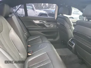 2018 BMW 7 Series 740e xDrive with VIN WBA7J2C57JG938291, listed as a Copart auction lot 58337763 with 53,259 mi miles and . Bid and sale history available at DreamBid. Image 10.