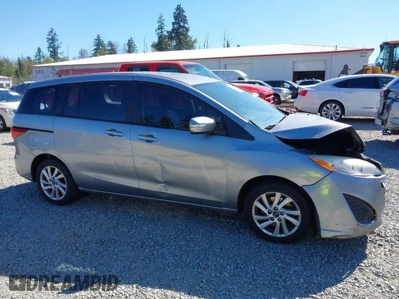 2014 Mazda 5 Sport z VIN JM1CW2BL0E0172678, wystawiony jako IAAI lot #42192057 z przebiegiem 89 848 mil mil oraz . Historia ofert i sprzedaży dostępna na DreamBid. Obrazek 13.