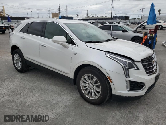 2019 Cadillac XT5 FWD with VIN 1GYKNARS5KZ215029, listed as a Copart auction lot 52828495 with 74,525 mi miles and Salvage title. Bid and sale history available at DreamBid. Image 4.