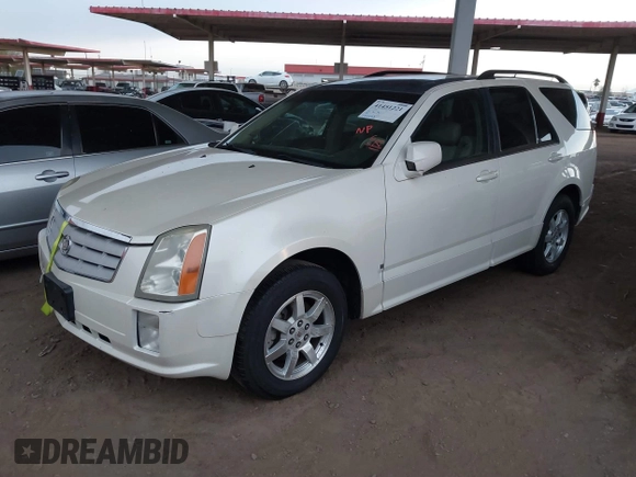 2008 Cadillac SRX AWD with VIN 1GYEE637X80102608, listed as a IAAI auction lot 41451221 with 151,552 mi miles. Bid and sale history available at carsss.com. Image 2.