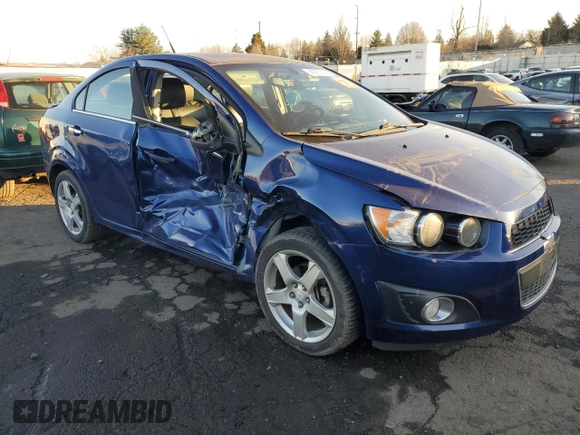 2014 Chevrolet Sonic LTZ with VIN 1G1JE5SB8E4219086, listed as a Copart auction lot 88990405 with 96,177 mi miles and Salvage Title. Bid and sale history available at carsss.com. Image 4.