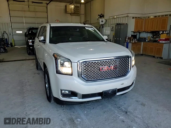 2015 GMC Yukon Denali with VIN 1GKS2CKJ7FR266750, listed as a Copart auction lot 47882125 with 121,705 mi miles and Salvage Title. Bid and sale history available at carsss.com. Image 12.