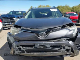 2016 Toyota RAV4 LE with VIN JTMBFREV4GJ052168, listed as a IAAI auction lot 41837564 with 73,659 mi miles. Bid and sale history available at carsss.com. Image 12.