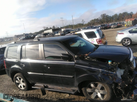 2012 Honda Pilot Touring with VIN 5FNYF3H90CB035309, listed as a IAAI auction lot 41063215 with 228,081 mi miles and . Bid and sale history available at carsss.com. Image 13.