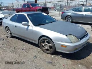 2001 Honda Prelude with VIN JHMBB62421C003129, listed as a IAAI auction lot 41989431 with 225,130 mi miles and . Bid and sale history available at DreamBid. Image 1.