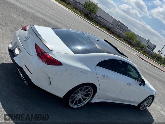 2019 Mercedes-Benz CLS with VIN WDD2J5JB0KA015104, listed as a IAAI auction lot 42108693 with 59,102 mi miles. Bid and sale history available at carsss.com. Image 4.