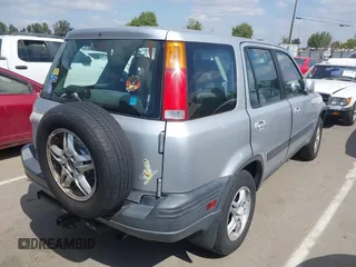 1998 Honda CR-V EX with VIN JHLRD1865WC074566, listed as a IAAI auction lot 42051977 with 233,133 mi miles. Bid and sale history available at carsss.com. Image 4.