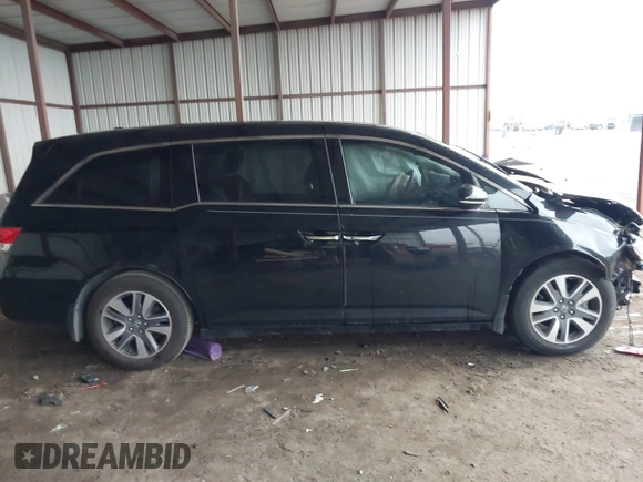 2014 Honda Odyssey Touring with VIN 5FNRL5H98EB095835, listed as a IAAI auction lot 42153412 with 124,131 mi miles and . Bid and sale history available at DreamBid. Image 14.