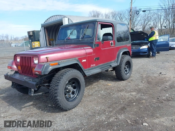 1987 Jeep Wrangler Laredo with VIN 2BCCZ8148HB535575, listed as a IAAI auction lot 41889583 with 221,521 mi miles. Bid and sale history available at carsss.com. Image 2.