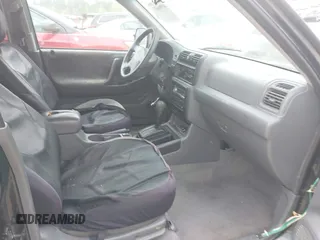2002 Isuzu Rodeo S z VIN 4S2CK58W524322789, wystawiony jako IAAI lot #41966033 z przebiegiem 251 311 mil mil oraz . Historia ofert i sprzedaży dostępna na DreamBid. Obrazek 5.
