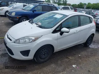2013 Ford Fiesta S with VIN 3FADP4TJ4DM164594, listed as a IAAI auction lot 42154202 with 75,860 mi miles and . Bid and sale history available at DreamBid. Image 6.