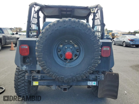 1990 Jeep Wrangler with VIN 2J4FY29T5LJ537896, listed as a Copart auction lot 57021295 with 143,753 mi miles and Clean title. Bid and sale history available at DreamBid. Image 6.
