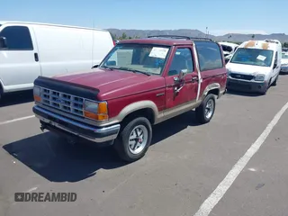 1989 Ford Bronco z VIN 1FMCU14T7KUB48942, wystawiony jako IAAI lot #40053705 z przebiegiem 96 024 mil mil oraz . Historia ofert i sprzedaży dostępna na DreamBid. Obrazek 2.
