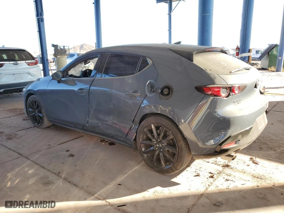 2019 Mazda Mazda3 Hatchback w/Premium Pkg with VIN JM1BPBNM9K1125071, listed as a Copart auction lot 86589954 with 63,157 mi miles and Salvage Title. Bid and sale history available at carsss.com. Image 2.