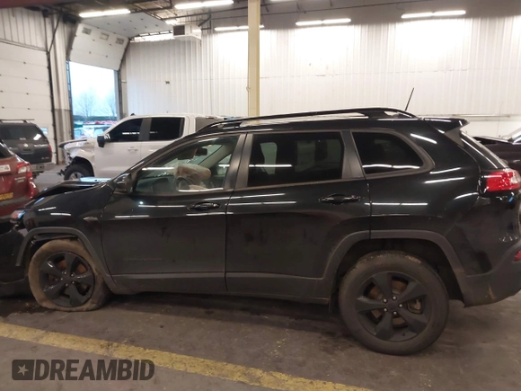 2016 Jeep Cherokee Latitude with VIN 1C4PJMCS3GW197351, listed as a IAAI auction lot 40967948 with 145,051 mi miles and . Bid and sale history available at carsss.com. Image 14.