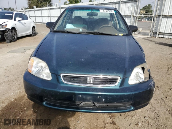 1998 Honda Civic LX with VIN JHMEJ6673WS016828, listed as a Copart auction lot 73740904 with 80,801 mi miles and Salvage Title. Bid and sale history available at carsss.com. Image 5.