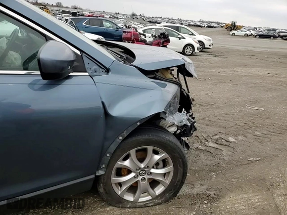 2014 Mazda CX-9 Sport with VIN JM3TB2BA7E0434407, listed as a Copart auction lot 45029515 with 117,200 mi miles and Salvage title. Bid and sale history available at DreamBid. Image 12.