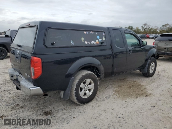 2009 Nissan Frontier SE with VIN 1N6AD06W69C400688, listed as a Copart auction lot 85140904 with 165,558 mi miles and Salvage title. Bid and sale history available at DreamBid. Image 3.