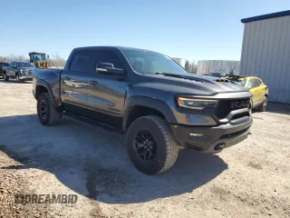 2021 Ram 1500 с VIN NCS107300, выставлен на аукционе Copart как лот 50989205 с пробегом 25 121 миль миль и Списание • Salvage title. История ставок и продаж доступна на DreamBid. Изображение 4.