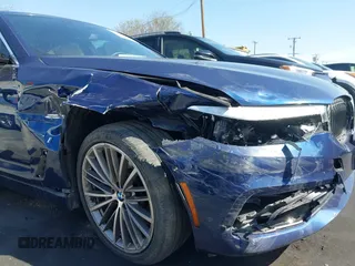 2019 BMW 5 Series 530e iPerformance with VIN WBAJA9C59KB389898, listed as a IAAI auction lot 41479595 with 90,965 mi miles. Bid and sale history available at carsss.com. Image 6.