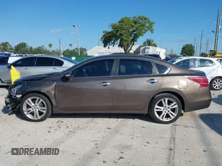 2013 Nissan Altima SL with VIN 1N4BL3APXDN433871, listed as a IAAI auction lot 42039383 with 161,200 mi miles and . Bid and sale history available at DreamBid. Image 14.