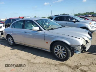 2002 Jaguar S-Type with VIN SAJDA01P52GM27504, listed as a Copart auction lot 57850944 with 119,707 mi miles and Clean Title. Bid and sale history available at DreamBid. Image 4.