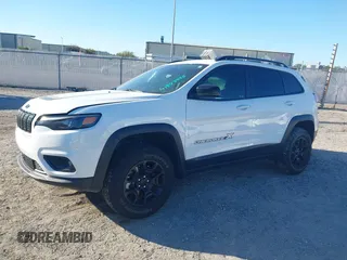 2022 Jeep Cherokee X with VIN 1C4PJMCX2ND533284, listed as a IAAI auction lot 41827335 with 19,404 mi miles. Bid and sale history available at carsss.com. Image 2.