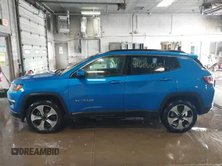 2020 Jeep Compass Latitude with VIN 3C4NJDBBXLT104849, listed as a IAAI auction lot 41606035 with 116,706 mi miles. Bid and sale history available at carsss.com. Image 14.