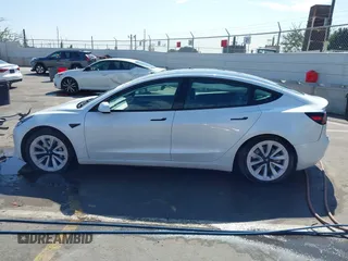 2023 Tesla Model 3 with VIN 5YJ3E1EA9PF640015, listed as a IAAI auction lot 41622086 with 15,622 mi miles and . Bid and sale history available at carsss.com. Image 14.