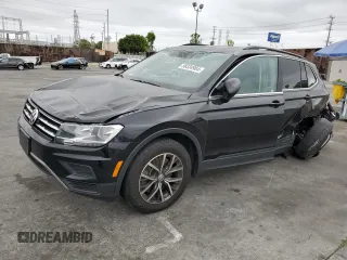 2019 Volkswagen Tiguan SE with VIN 3VV3B7AX8KM198808, listed as a Copart auction lot 52828995 with 54,919 mi miles and Salvage Title. Bid and sale history available at DreamBid. Image 1.
