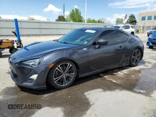 2015 Scion FR-S z VIN JF1ZNAA12F8707784, wystawiony jako Copart lot #56248735 z przebiegiem 119 679 mil mil oraz Szkoda całkowita • Salvage title. Historia ofert i sprzedaży dostępna na DreamBid. Obrazek 1.