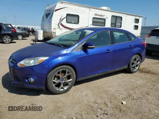 2013 Ford Focus SE with VIN 1FADP3F29DL352186, listed as a Copart auction lot 64972835 with 74,409 mi miles and Clean title. Bid and sale history available at DreamBid. Image 1.