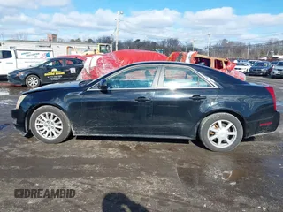 2012 Cadillac CTS with VIN 1G6DC5E5XC0144060, listed as a IAAI auction lot 41596919 with 108,151 mi miles and . Bid and sale history available at DreamBid. Image 14.