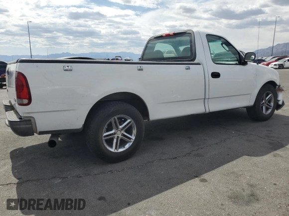 2004 Ford F-150 XL with VIN 2FTRF17294CA59985, listed as a Copart auction lot 55296195 with 220,933 mi miles and Salvage title. Bid and sale history available at DreamBid. Image 3.