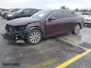 2017 Kia Optima LX with VIN 5XXGT4L32HG133274, listed as a IAAI auction lot 41369915 with 147,877 mi miles. Bid and sale history available at carsss.com. Image 2.