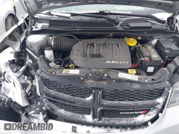 2018 Dodge Grand Caravan SE Plus with VIN 2C4RDGBG2JR254945, listed as a IAAI auction lot 41716809 with 99,404 mi miles and . Bid and sale history available at DreamBid. Image 10.
