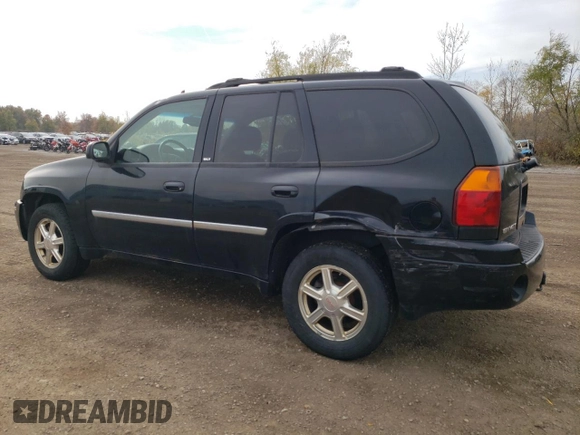 2007 GMC Envoy SLT with VIN 1GKDT13S972197393, listed as a Copart auction lot 77958764 with 151,586 mi miles and Salvage Title. Bid and sale history available at DreamBid. Image 2.