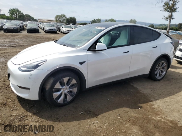 2023 Tesla Model Y Long Range z VIN 7SAYGDEE3PF815088, wystawiony jako Copart lot #54849895 z przebiegiem 19 637 mil mil oraz Szkoda całkowita • Salvage title. Historia ofert i sprzedaży dostępna na DreamBid. Obrazek 1.