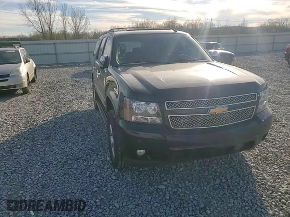 2013 Chevrolet Tahoe LTZ with VIN 1GNSCCE04DR162474, listed as a Copart auction lot 49386335 with 331,358 mi miles and Salvage title. Bid and sale history available at DreamBid. Image 11.