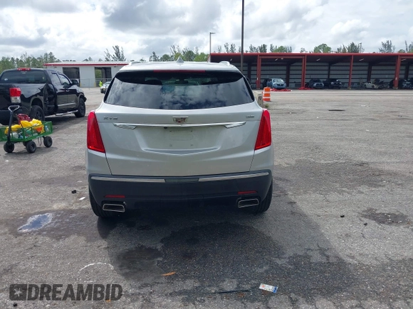 2019 Cadillac XT5 FWD z VIN 1GYKNARSXKZ242727, wystawiony jako IAAI lot #41669220 z przebiegiem 62 812 mil mil oraz . Historia ofert i sprzedaży dostępna na DreamBid. Obrazek 16.