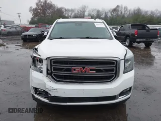 2015 GMC Yukon XL SLT with VIN 1GKS1HKC7FR223513, listed as a IAAI auction lot 40822575 with 128,239 mi miles. Bid and sale history available at carsss.com. Image 12.