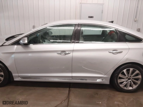 2015 Hyundai Sonata 2.4L Sport with VIN 5NPE34AF3FH141616, listed as a IAAI auction lot 41005650 with 138,291 mi miles. Bid and sale history available at carsss.com. Image 14.