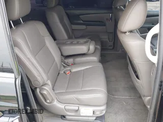 2015 Honda Odyssey Touring Elite with VIN 5FNRL5H97FB124565, listed as a IAAI auction lot 42358412 with 206,444 mi miles and . Bid and sale history available at DreamBid. Image 8.