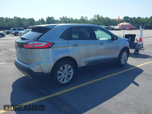 2021 Ford Edge Titanium with VIN 2FMPK3K97MBA15391, listed as a IAAI auction lot 42711656 with 40,723 mi miles and . Bid and sale history available at DreamBid. Image 4.