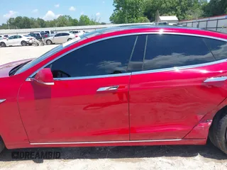 2016 Tesla Model S 90D with VIN 5YJSA1E48GF144821, listed as a IAAI auction lot 42206473 with 129,624 mi miles and . Bid and sale history available at DreamBid. Image 14.