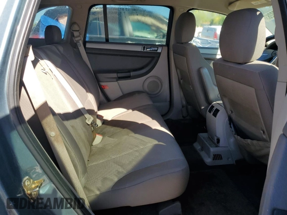 2005 Chrysler Pacifica z VIN 2C4GF484X5R413830, wystawiony jako Copart lot #63380283 z przebiegiem Nie podano mil oraz Nie do naprawy • Non repairable. Historia ofert i sprzedaży dostępna na DreamBid. Obrazek 10.