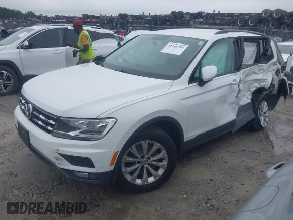 2018 Volkswagen Tiguan S with VIN 3VV1B7AX1JM032250, listed as a IAAI auction lot 42366790 with 65,406 mi miles and . Bid and sale history available at DreamBid. Image 17.