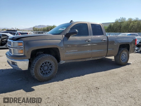 2015 Chevrolet Silverado 1500 LT with VIN 1GCRCREC2FZ388049, listed as a Copart auction lot 76098054 with 131,051 mi miles and Salvage Title. Bid and sale history available at DreamBid. Image 1.
