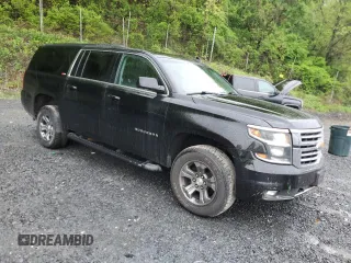 2018 Chevrolet Suburban LT with VIN 1GNSKHKC6JR130670, listed as a Copart auction lot 55339695 with 98,180 mi miles and Salvage Title. Bid and sale history available at DreamBid. Image 4.